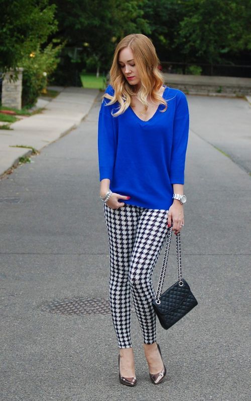 Cobalt blue sweater with houndstooth leggings.